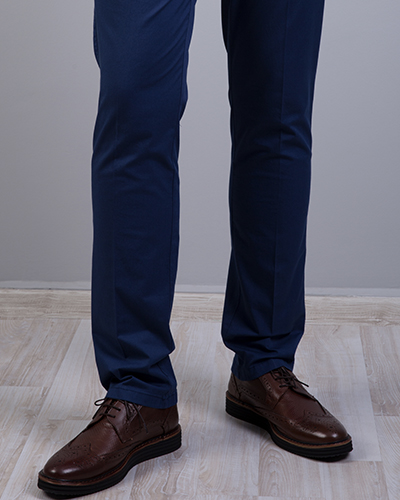 A pair of slim-fit navy chinos